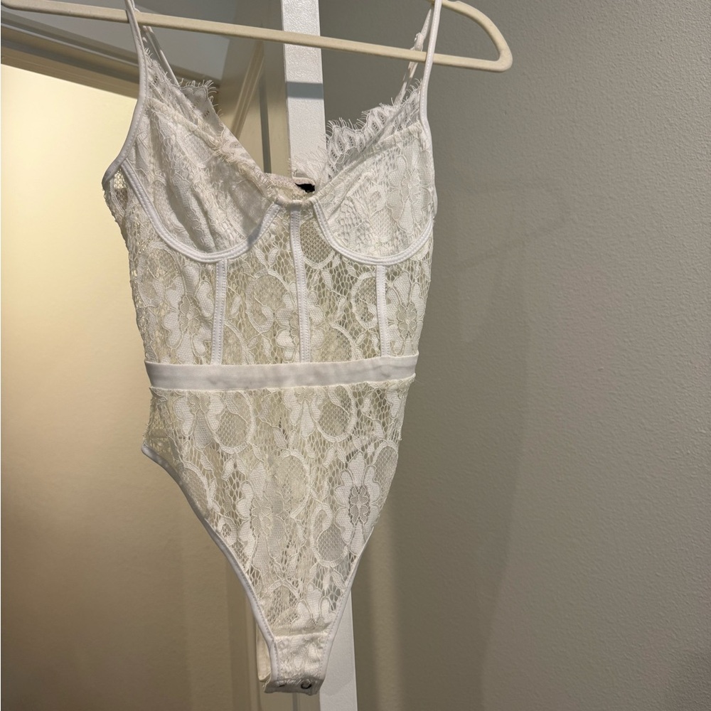 Elegant White Lace Bodysuit